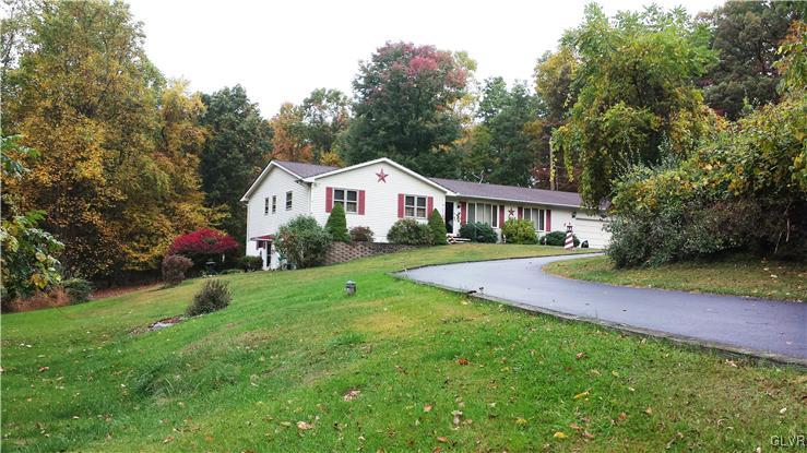 547 Turkey Ridge Road Mount Bethel, PA 18343 - Photo 2 of 14 a front view of a house with garden