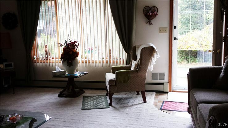 547 Turkey Ridge Road Mount Bethel, PA 18343 - Photo 3 of 14 a living room with furniture and a window