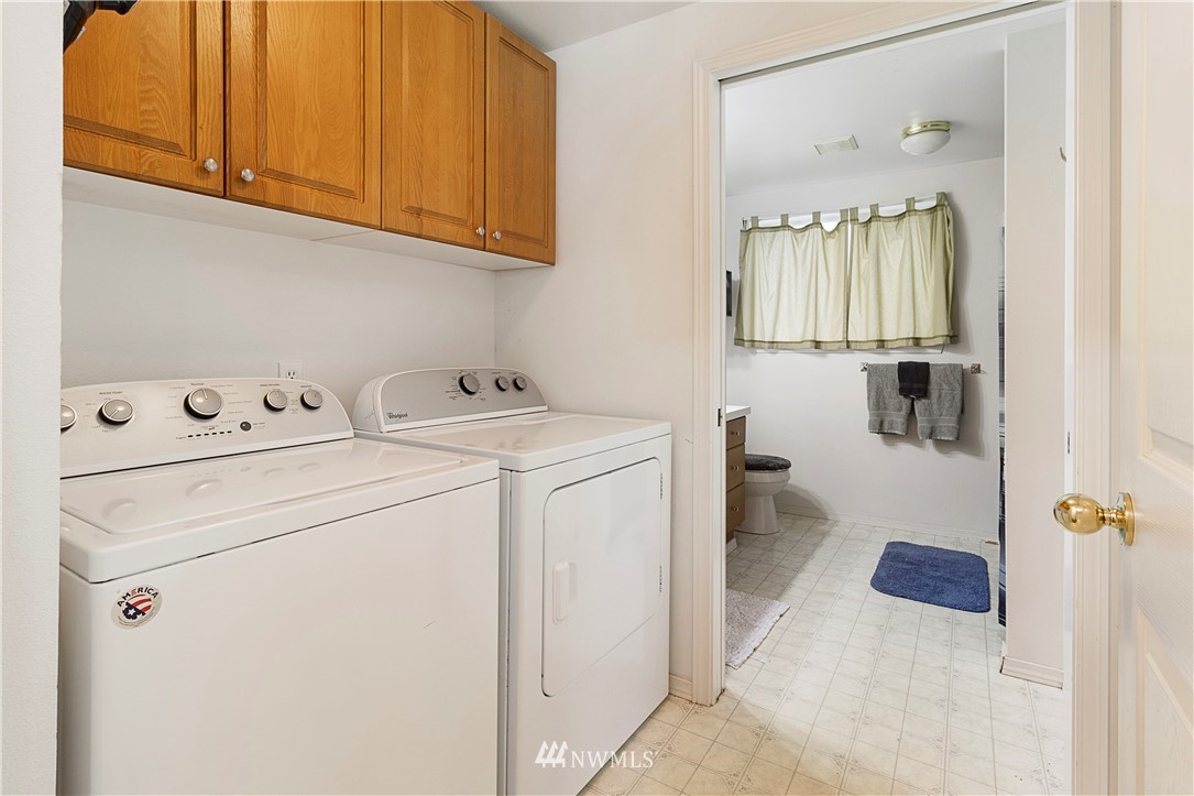 26410 218th Avenue Southeast Maple Valley, WA 98038 - Photo 20 of 28 a utility room with dryer and washer