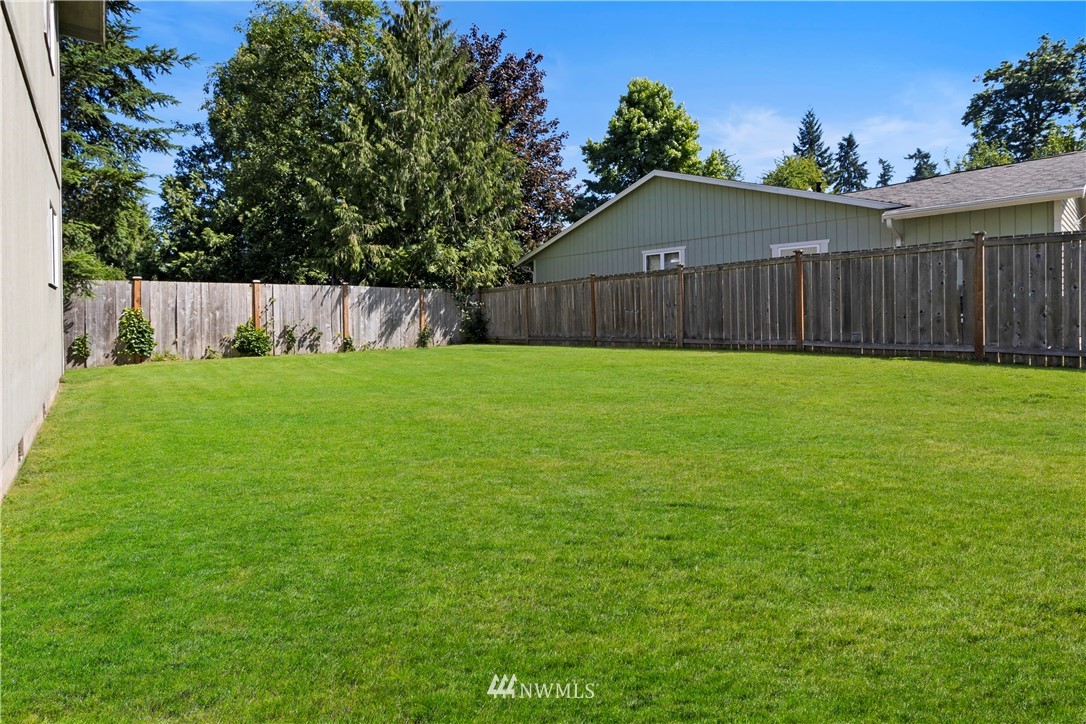 26410 218th Avenue Southeast Maple Valley, WA 98038 - Photo 24 of 28 a view of a backyard with small cabin