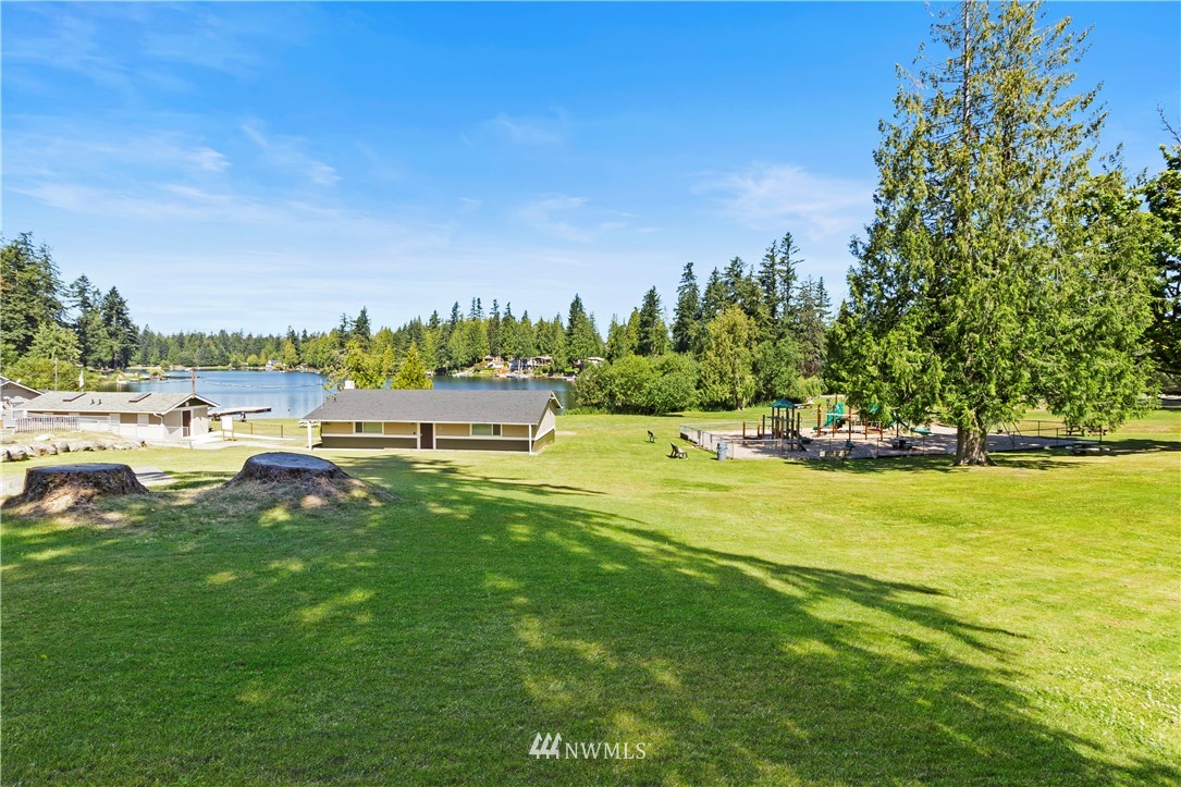 26410 218th Avenue Southeast Maple Valley, WA 98038 - Photo 25 of 28 a view of yard with ocean and houses in the back