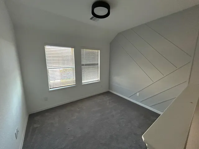 a view of hallway with stairs
