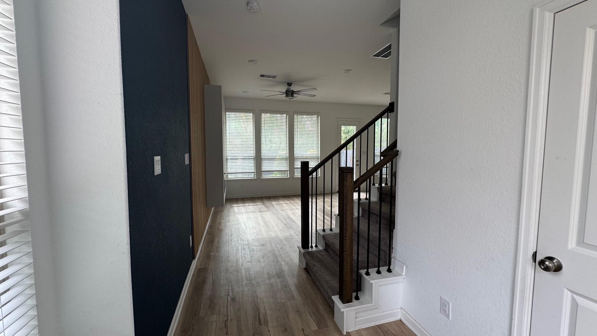 975 Lars Trek Trail Conroe, TX 77304 - Photo 20 of 36 a view of hallway with stairs