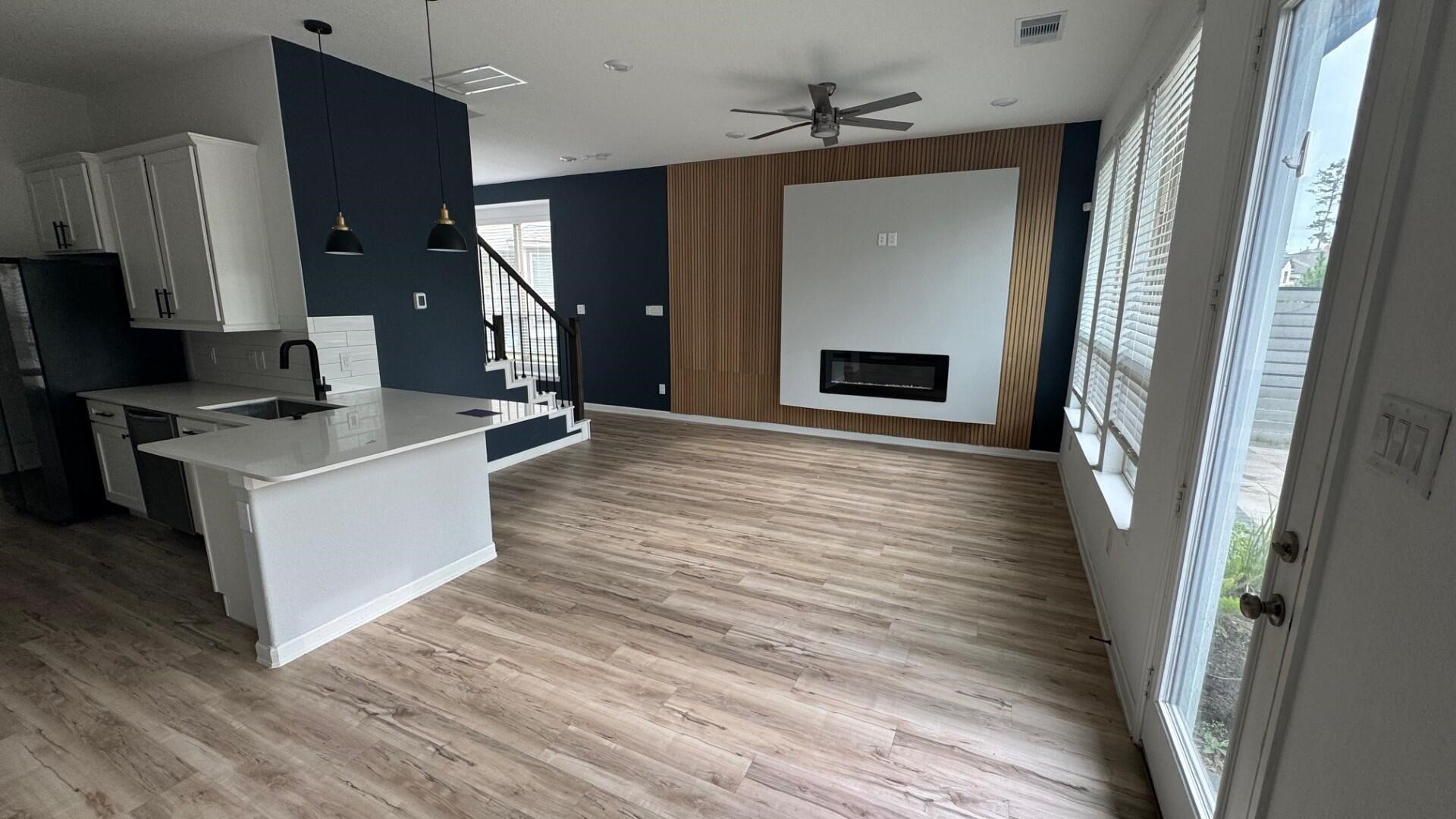 975 Lars Trek Trail Conroe, TX 77304 - Photo 21 of 36 a room with furniture and a fireplace