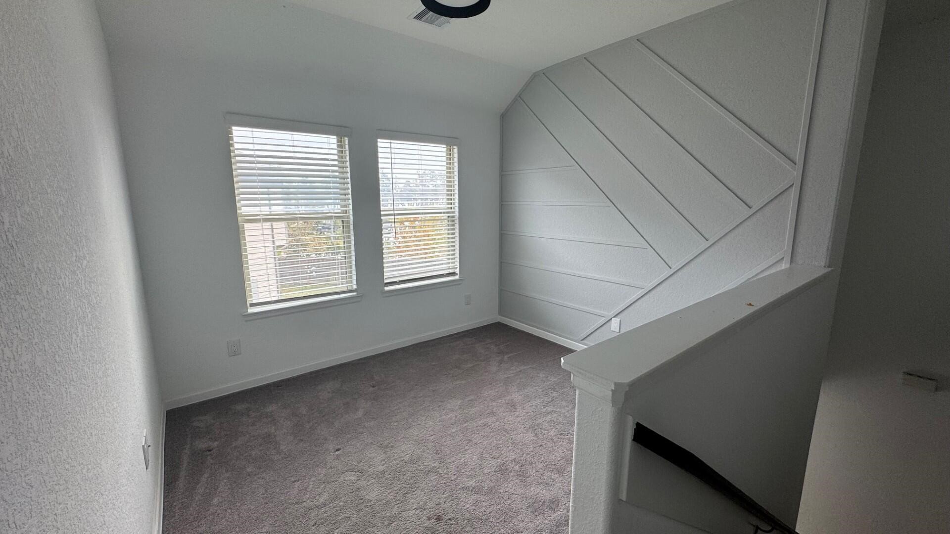 975 Lars Trek Trail Conroe, TX 77304 - Photo 25 of 36 an empty room with windows