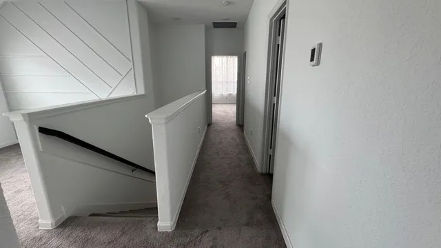 a bathroom with a double vanity sink and mirror