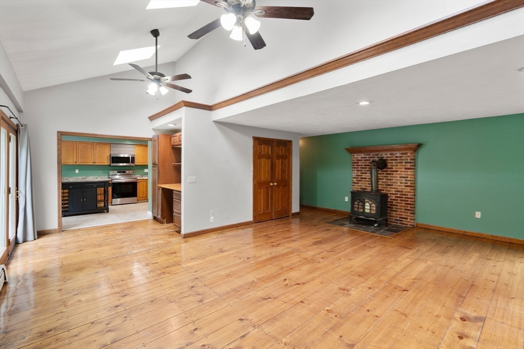 29 Chipper Hill Road Northbridge, MA 01534 - Photo 12 of 36 a view of an empty room with window and cabinet