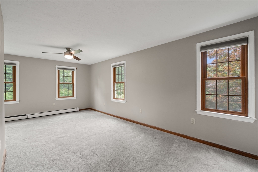 29 Chipper Hill Road Northbridge, MA 01534 - Photo 18 of 36 a view of an empty room with a window