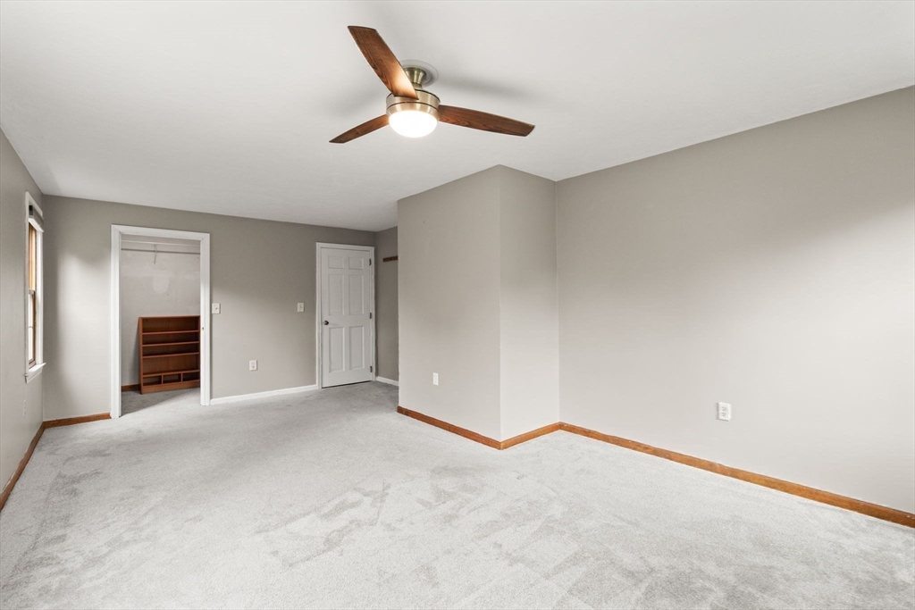 29 Chipper Hill Road Northbridge, MA 01534 - Photo 19 of 36 an empty room with closet and windows
