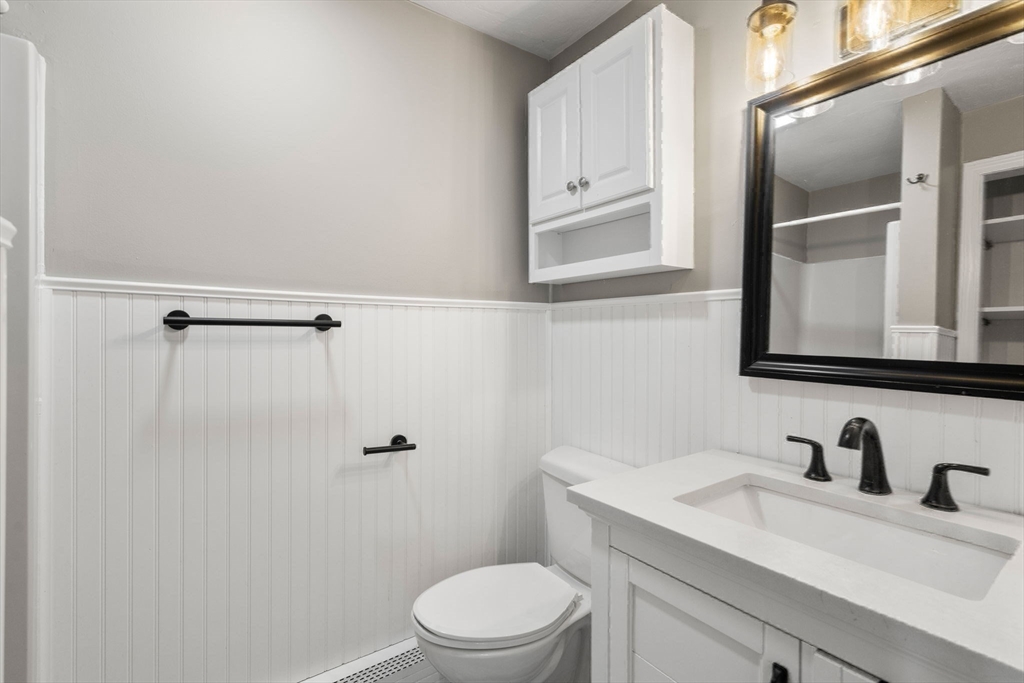 29 Chipper Hill Road Northbridge, MA 01534 - Photo 20 of 36 a bathroom with a granite countertop sink toilet and shower