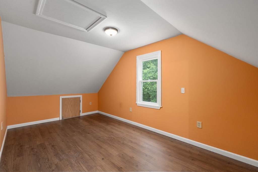 29 Chipper Hill Road Northbridge, MA 01534 - Photo 28 of 36 an empty room with wooden floor and windows