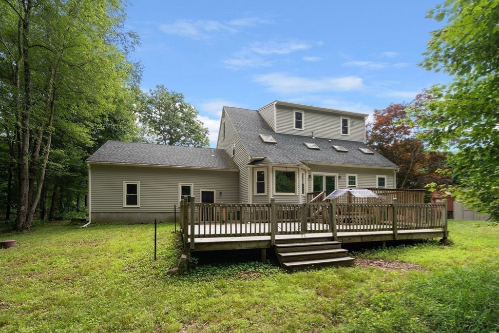 29 Chipper Hill Road Northbridge, MA 01534 - Photo 33 of 36 a front view of a house with garden
