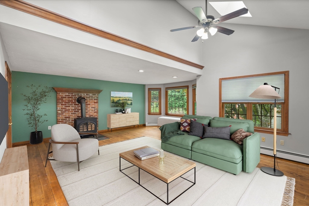 29 Chipper Hill Road Northbridge, MA 01534 - Photo 4 of 36 a living room with furniture and a large window