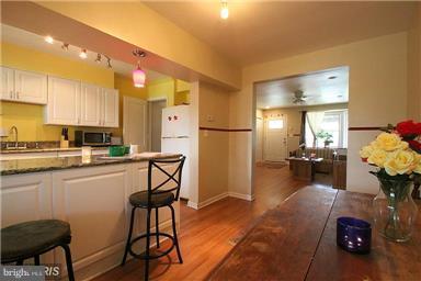 2018 Jasmine Road Baltimore, MD 21222 - Photo 3 of 6 a kitchen with a sink appliances and cabinets