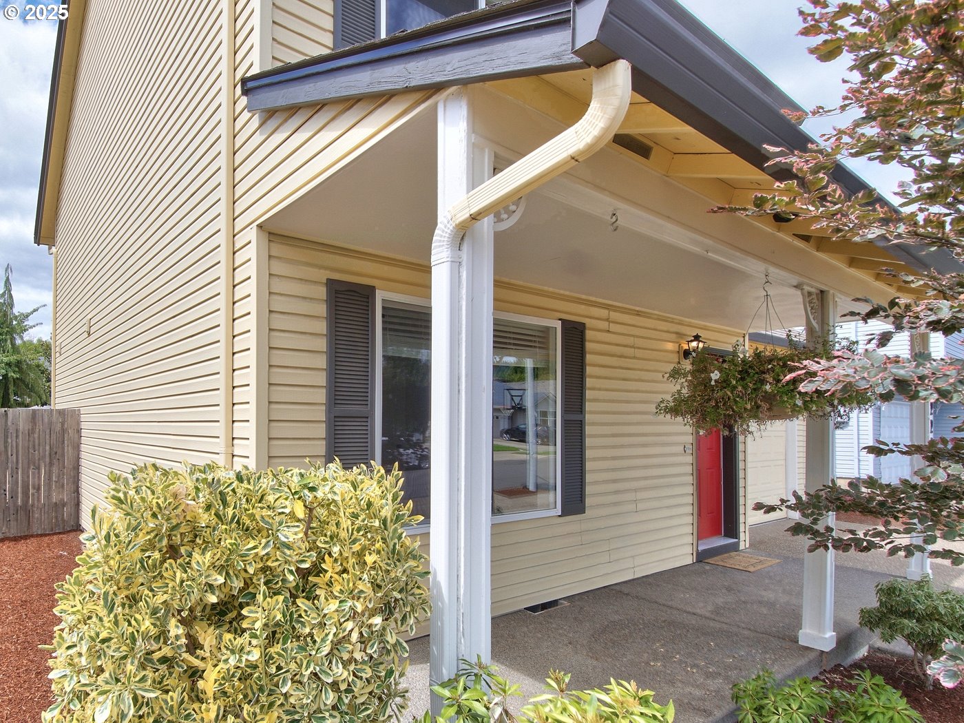 3229 North Meridian Street Newberg, OR 97132 - Photo 2 of 41 a view of a house with a small yard and plants