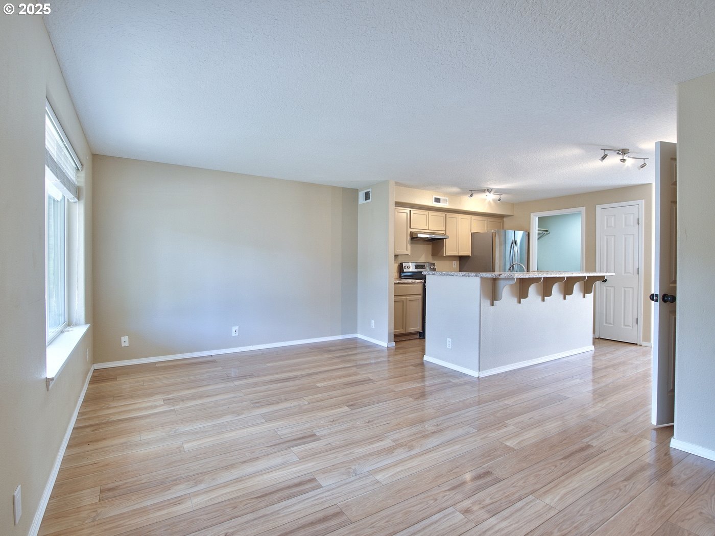 3229 North Meridian Street Newberg, OR 97132 - Photo 4 of 41 a view of a kitchen with wooden floor