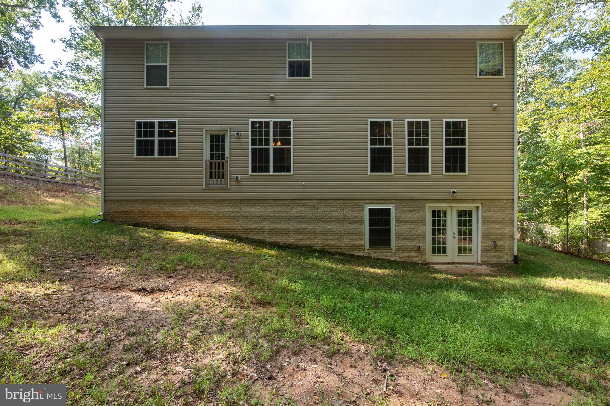 17983 Possum Point Road Dumfries, VA 22026 - Photo 36 of 37 Rear Elevation - Basement Walkout, Above Ground