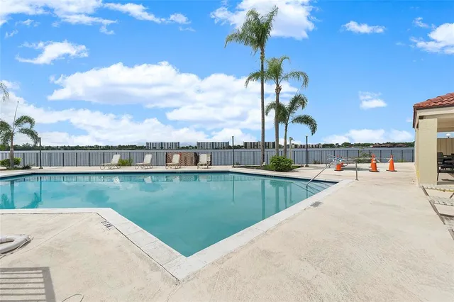 a view of a swimming pool and a terrace