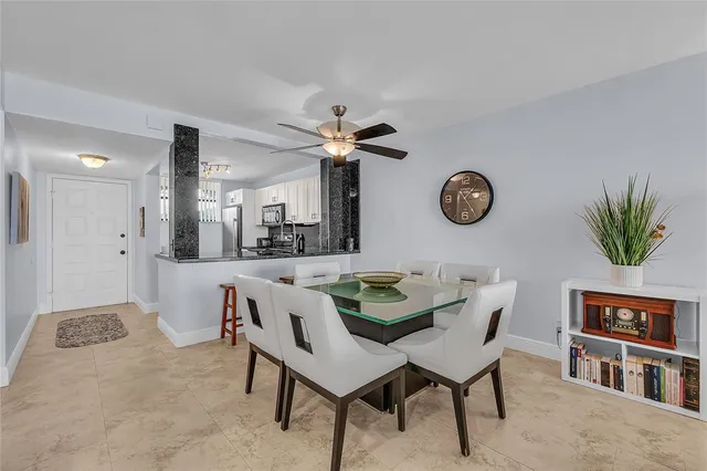 a view of a livingroom with furniture and a table