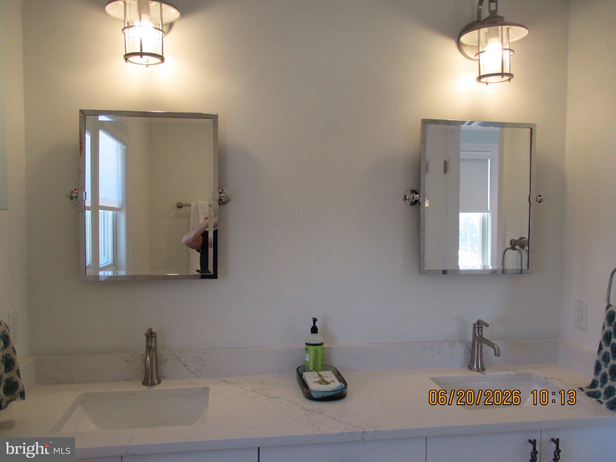 24 West 53rd Street Long Beach Township, NJ 08008 - Photo 75 of 75 Elegant dual-sink bathroom oasis.
