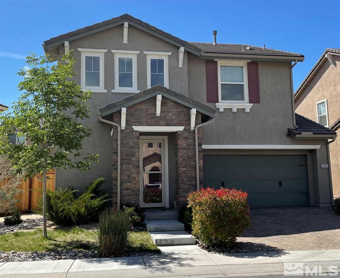2165 Hope Valley Drive Reno, NV 89521 - Photo 1 of 22 a front view of a house with garden