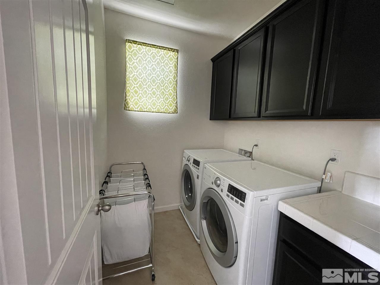 2165 Hope Valley Drive Reno, NV 89521 - Photo 12 of 22 a utility room with dryer and washer
