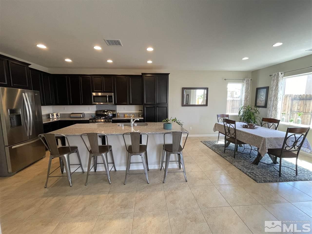 2165 Hope Valley Drive Reno, NV 89521 - Photo 5 of 22 a living room with stainless steel appliances lots of furniture and kitchen