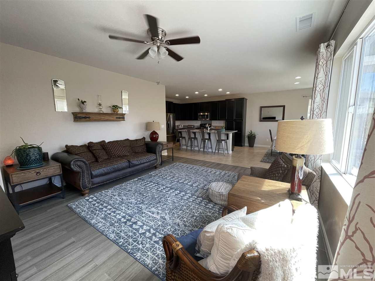2165 Hope Valley Drive Reno, NV 89521 - Photo 7 of 22 a living room with furniture and a wooden floor