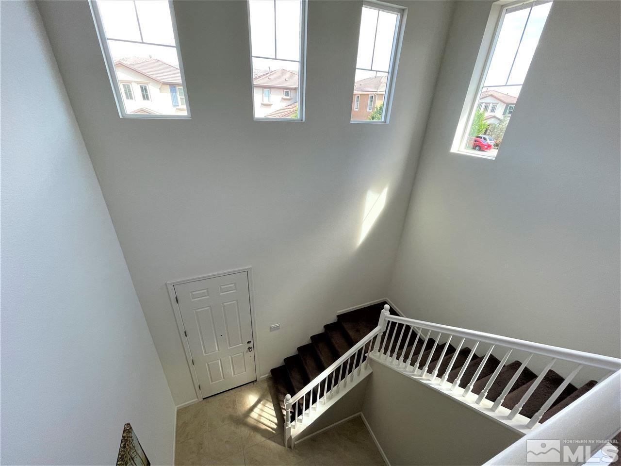 2165 Hope Valley Drive Reno, NV 89521 - Photo 9 of 22 a view of an empty room with windows