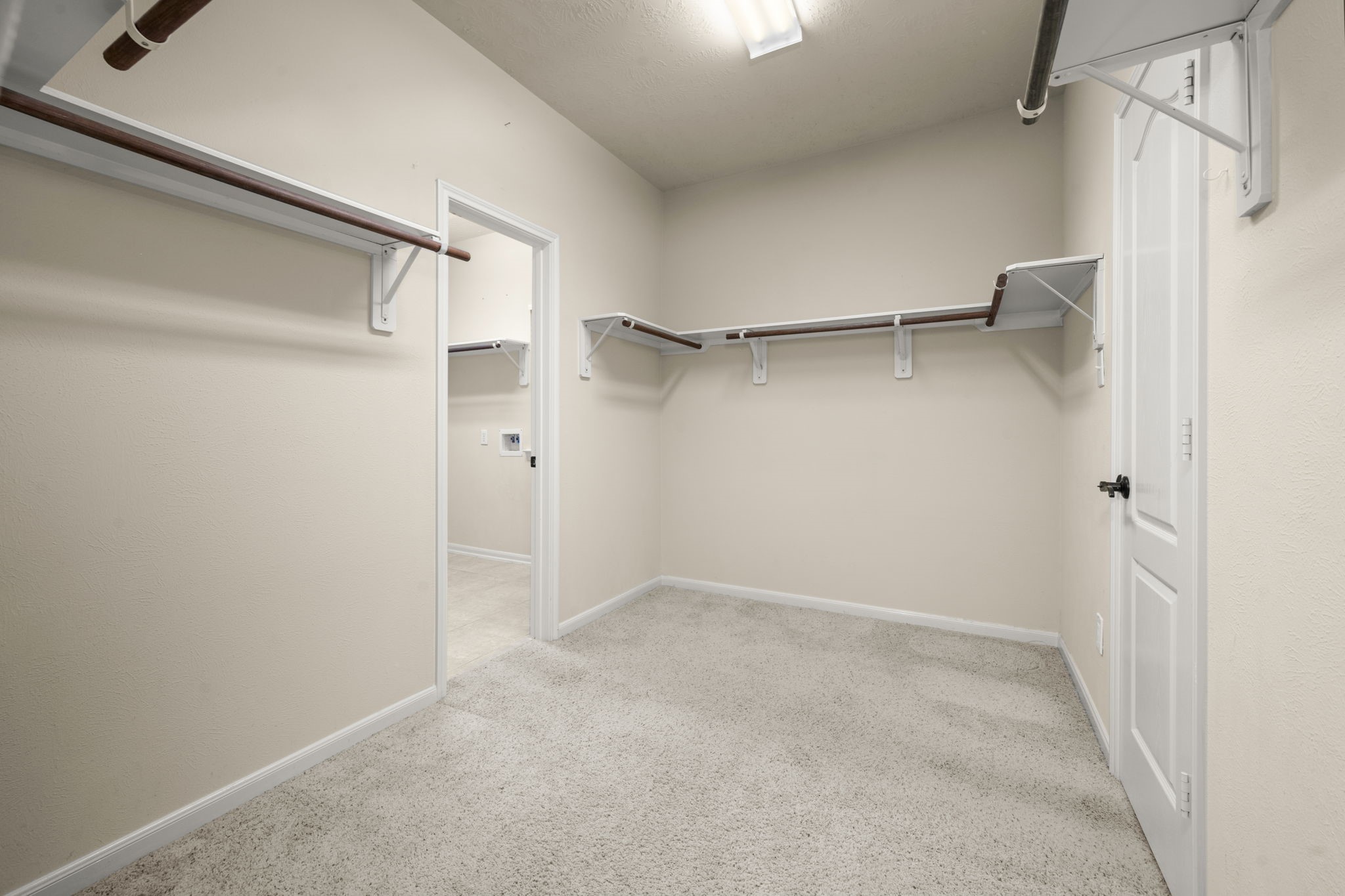 17411 Rainer Valley Lane Humble, TX 77346 - Photo 13 of 21 a view of an empty walk in closet