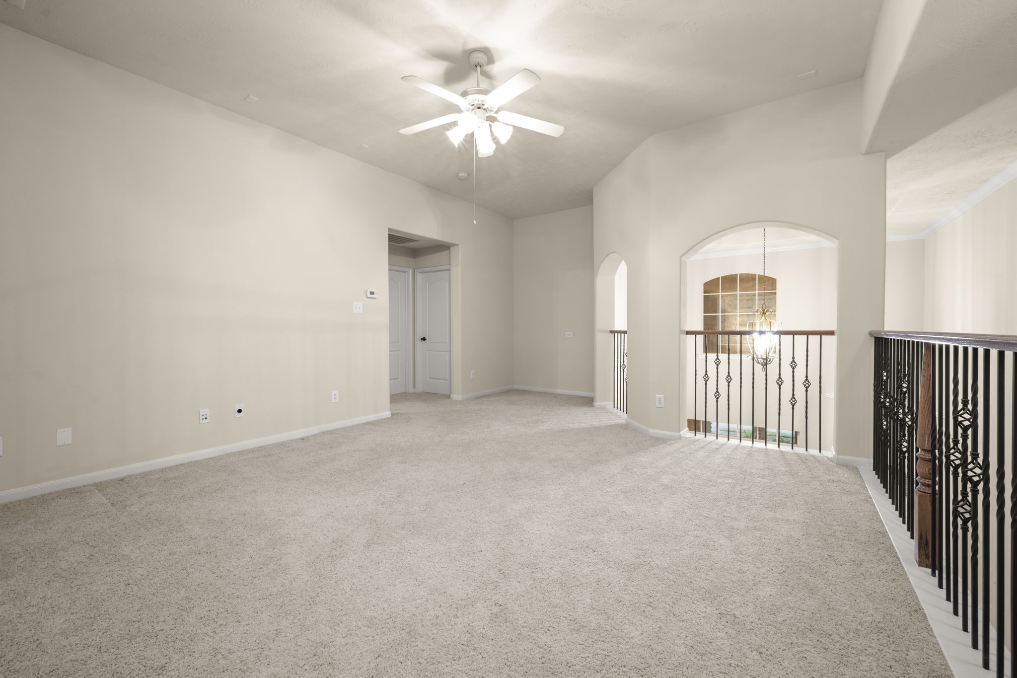 17411 Rainer Valley Lane Humble, TX 77346 - Photo 14 of 21 an empty room with chandelier fan