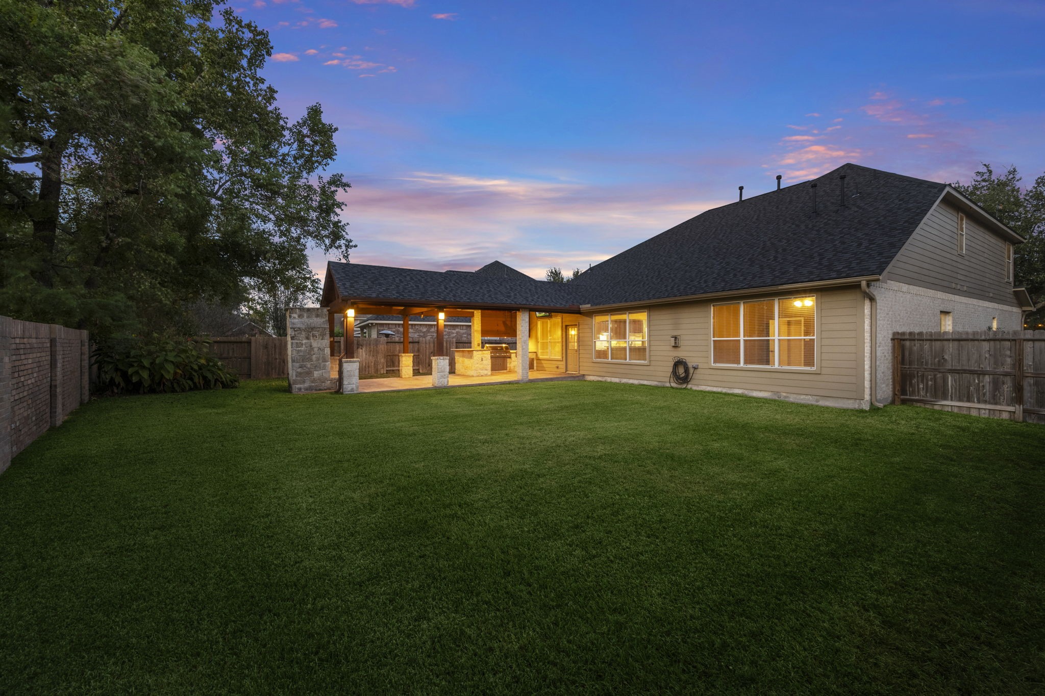 17411 Rainer Valley Lane Humble, TX 77346 - Photo 20 of 21 a backyard of a house with lots of green space