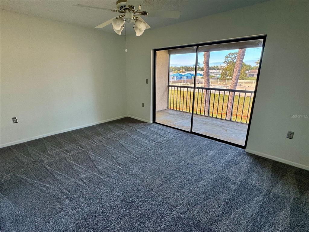 2131 Ridge Road South, Unit 105 Largo, FL 33778 - Photo 14 of 20 a view of an empty room with a window