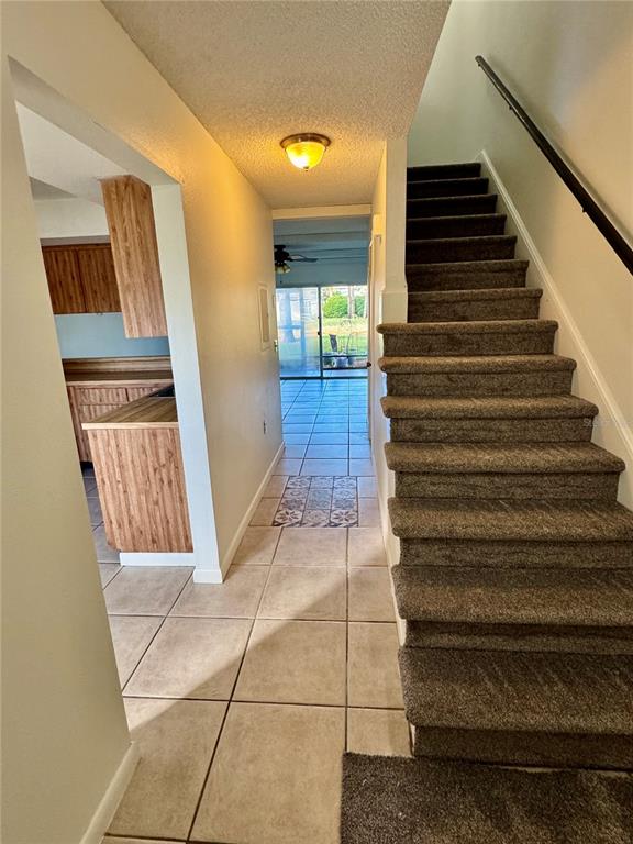 2131 Ridge Road South, Unit 105 Largo, FL 33778 - Photo 2 of 20 a view of entryway and hall with wooden floor