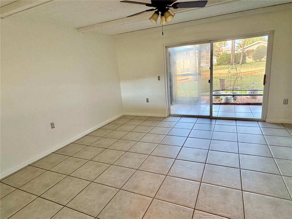 2131 Ridge Road South, Unit 105 Largo, FL 33778 - Photo 8 of 20 a view of an empty room and a window