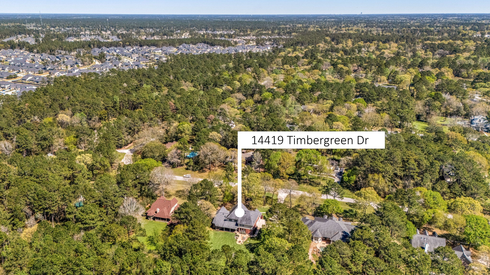 14419 Timbergreen Drive Magnolia, TX 77355 - Photo 38 of 43 Enjoy the serenity of a private, tree-lined setting while still being conveniently located near shopping, dining, and major roadways.