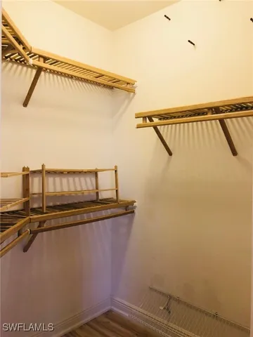 a view of balcony with wooden floor