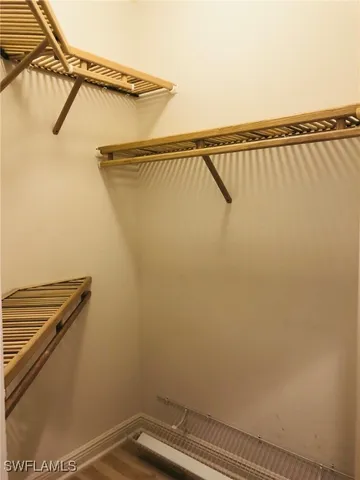 a view of a room with racks on the wall