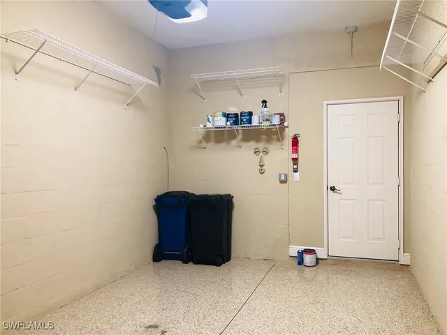 a view of a chairs and table in a patio