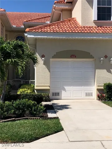 a view of a house with a large window