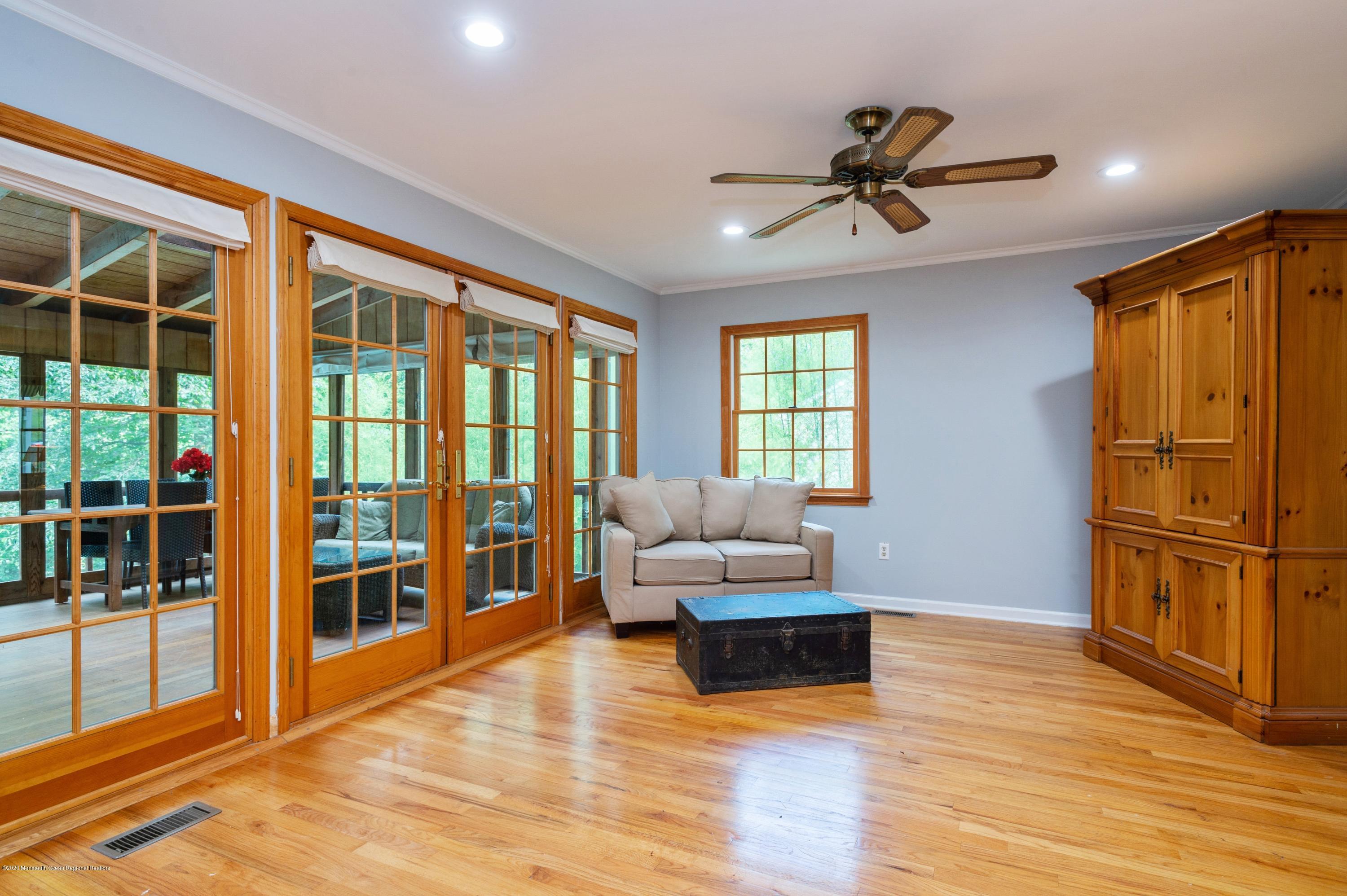 19 Tall Tree Road Middletown, NJ 07748 - Photo 10 of 24 07_19TallTreeRd_3_FamilyRoom_HiRes