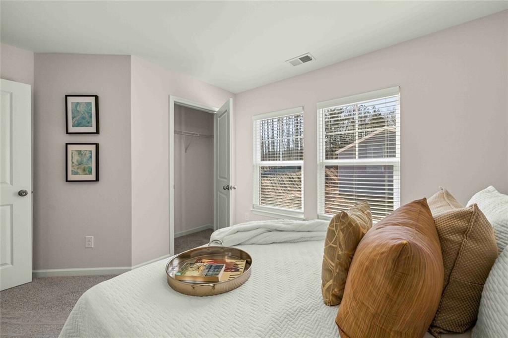 3489 Fairview Road, Unit MAGNOLIA Covington, GA 30016 - Photo 25 of 29 a living room with furniture and a window