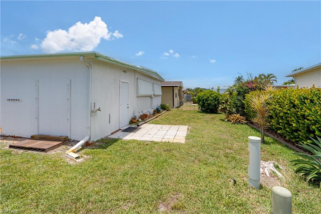 469 Riviera Boulevard West Naples, FL 34112 - Photo 23 of 31 Backyard