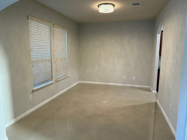 an empty room with windows