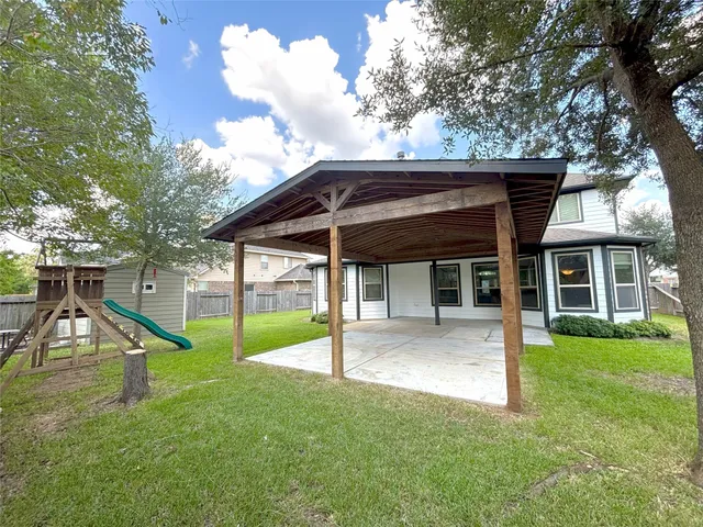 a view of a house with a park