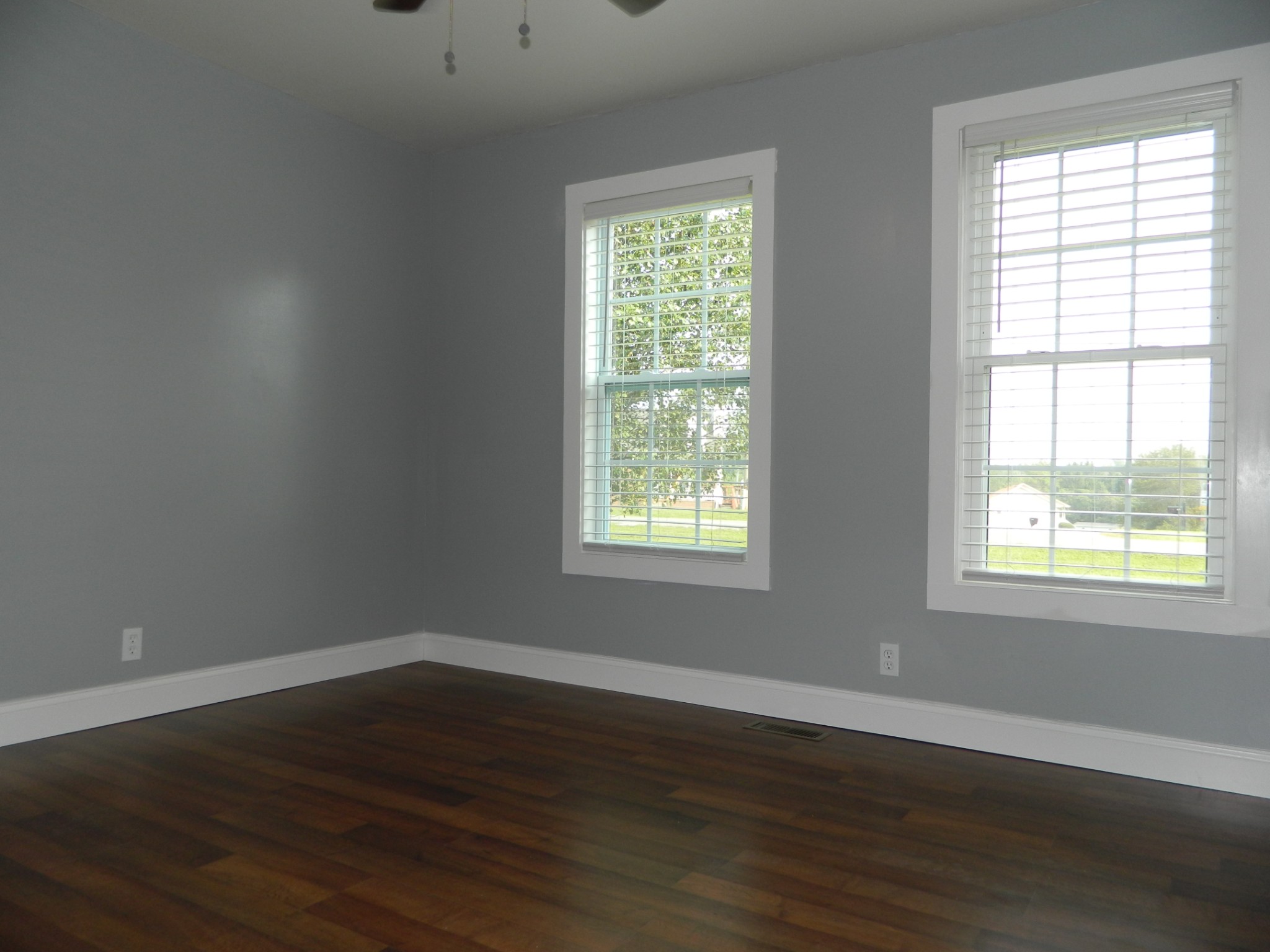 1276 Gip Manning Road Clarksville, TN 37042 - Photo 11 of 15 a view of an empty room with wooden floor and a window