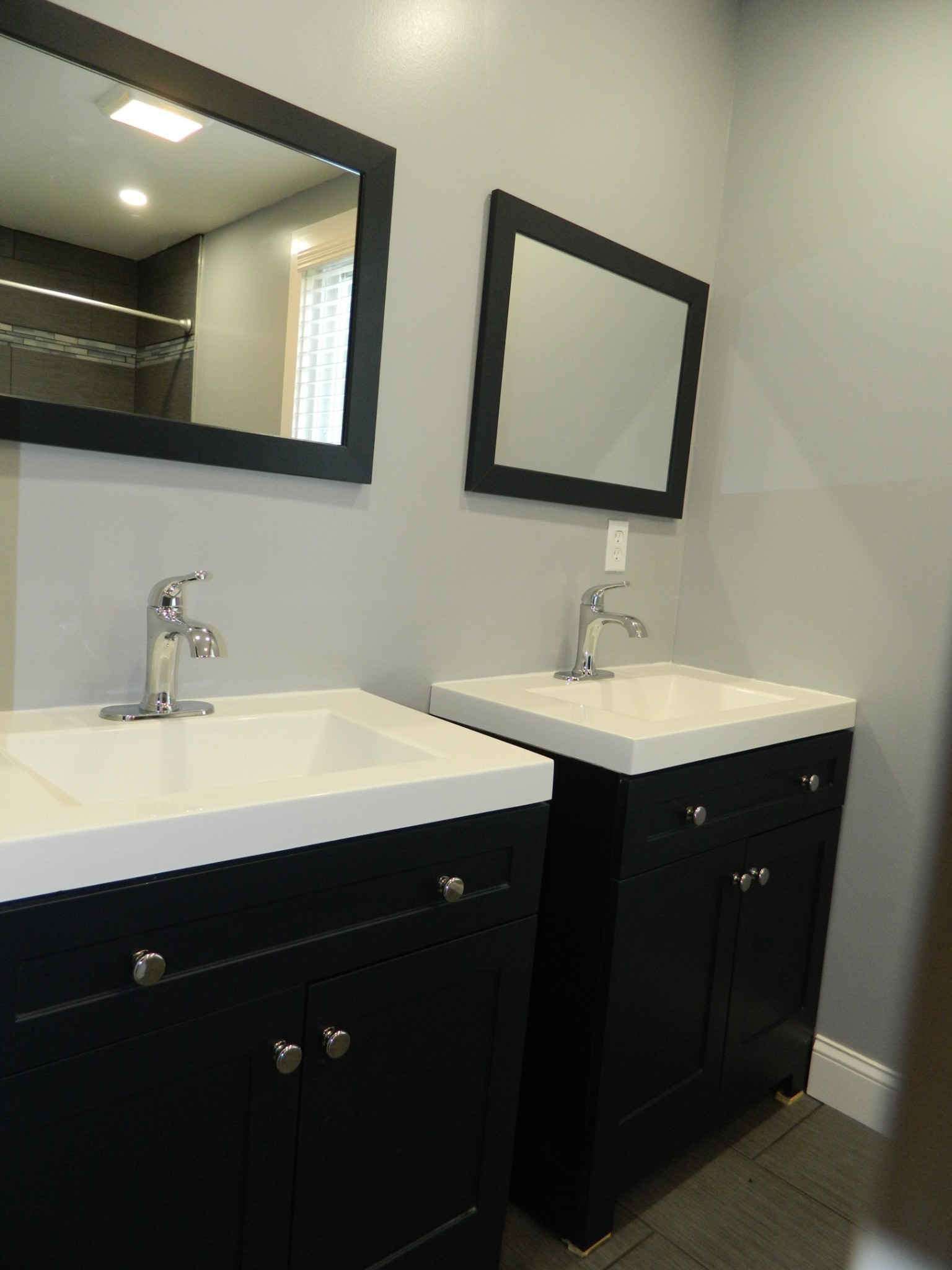 1276 Gip Manning Road Clarksville, TN 37042 - Photo 9 of 15 a bathroom with a double vanity sink and mirror