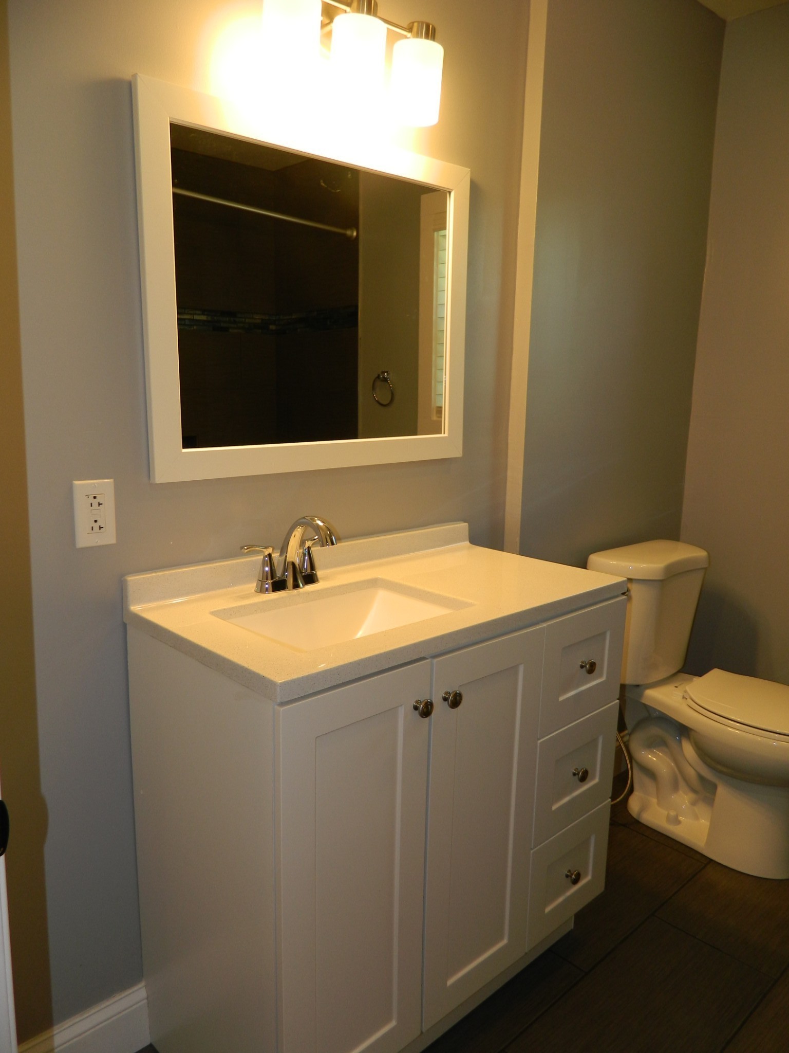 1276 Gip Manning Road Clarksville, TN 37042 - Photo 10 of 15 a bathroom with a granite countertop toilet sink and mirror