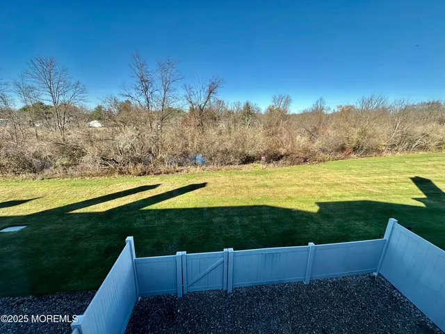a view of yard with ocean view
