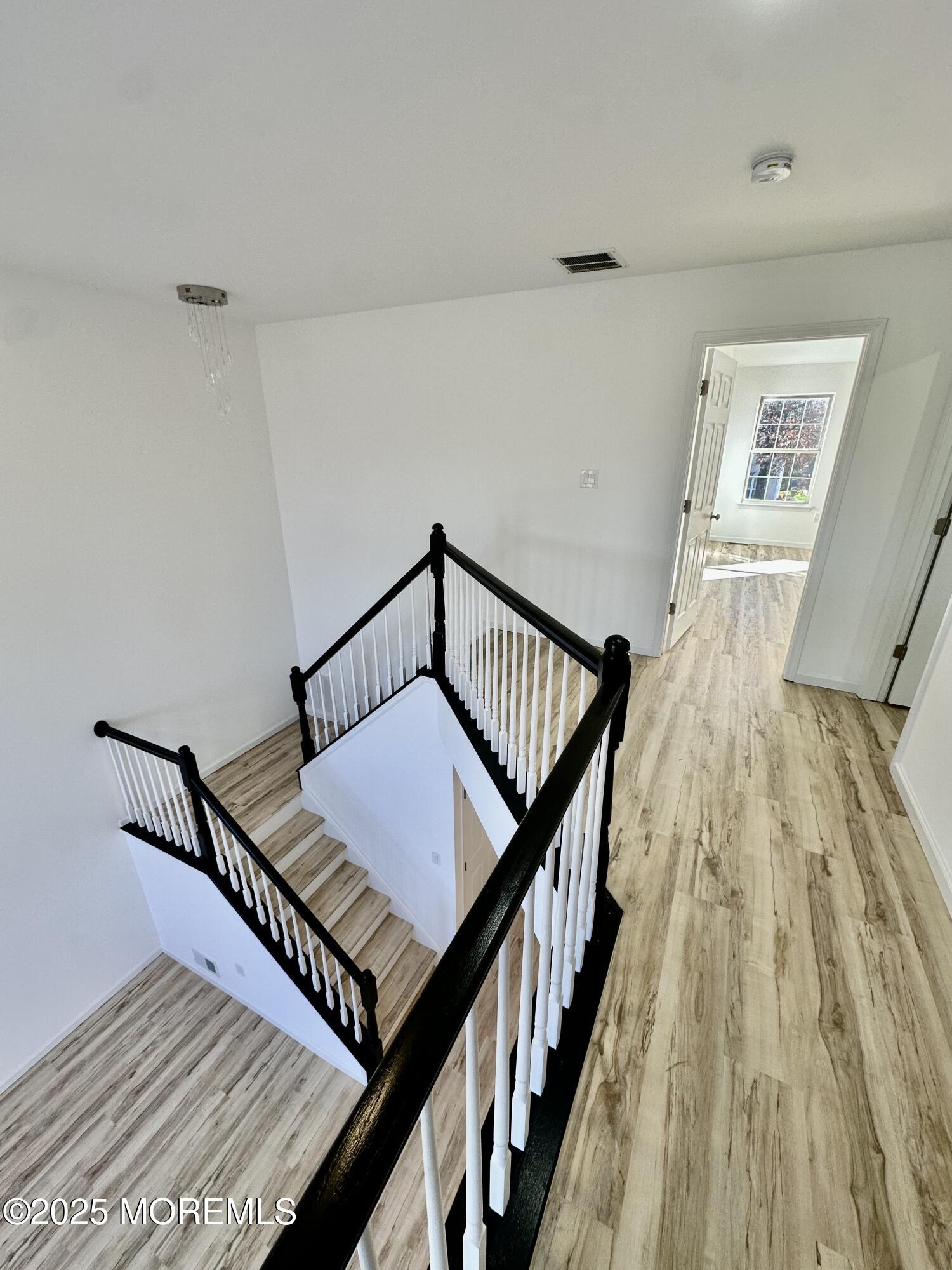 51 Picket Place Freehold, NJ 07728 - Photo 30 of 47 a view of wooden floor in a room